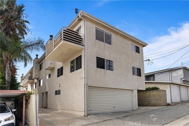 view of building exterior with a garage