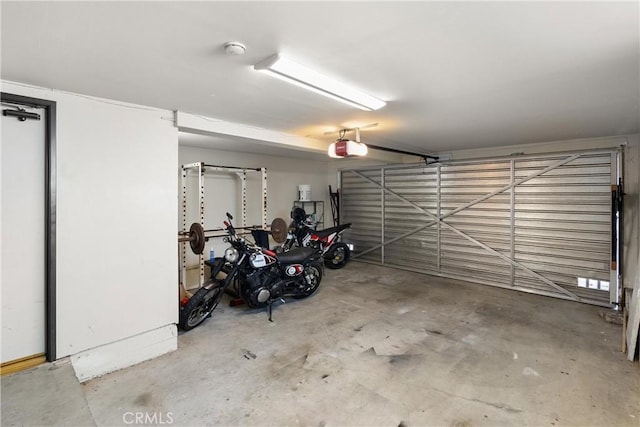 garage featuring a garage door opener