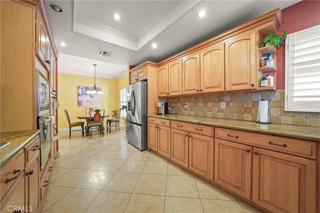 kitchen featuring pendant lighting, light tile patterned floors, crown molding, stainless steel appliances, and a raised ceiling