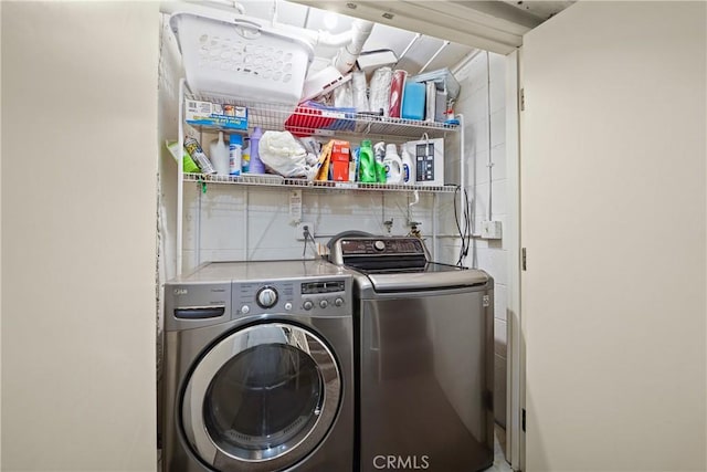 laundry area featuring separate washer and dryer