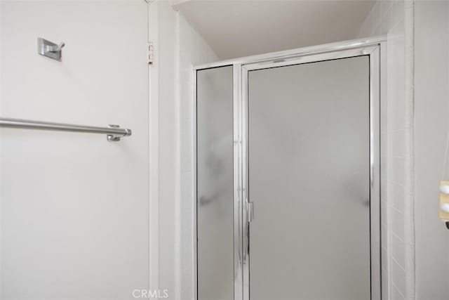 bathroom with an enclosed shower