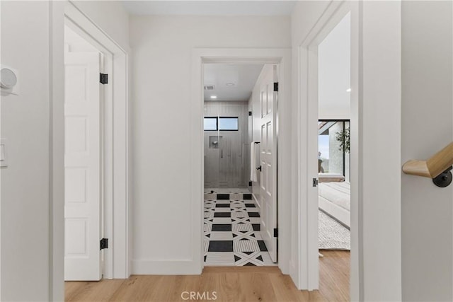 hall featuring light hardwood / wood-style flooring