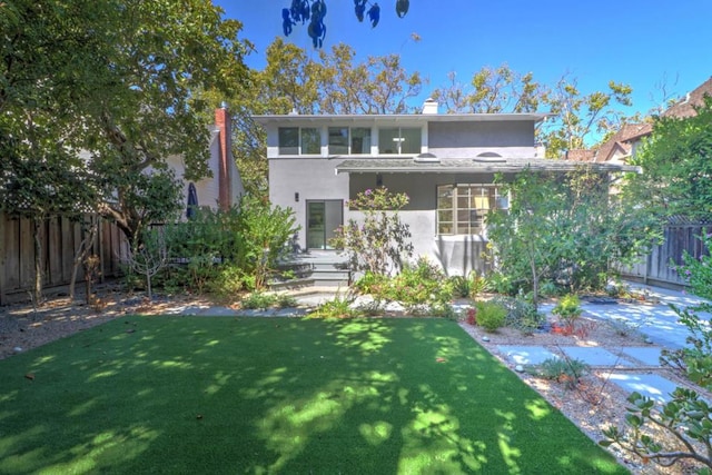 view of front of house with a front yard