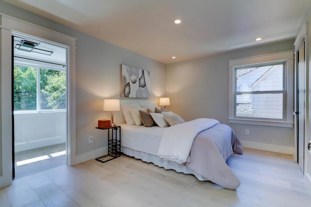 bedroom featuring light wood-type flooring