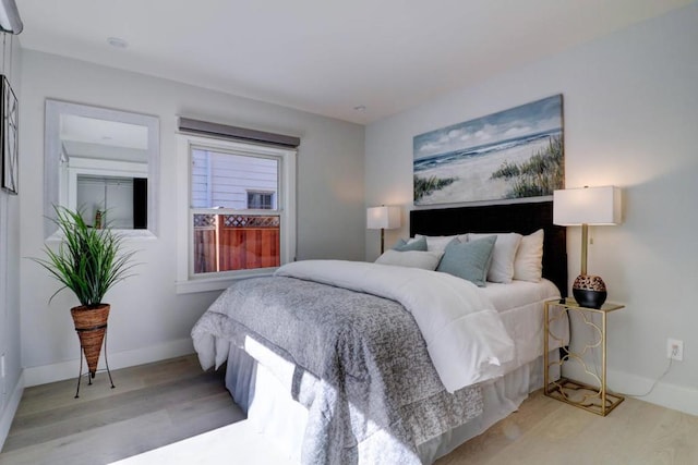 bedroom featuring light wood-type flooring