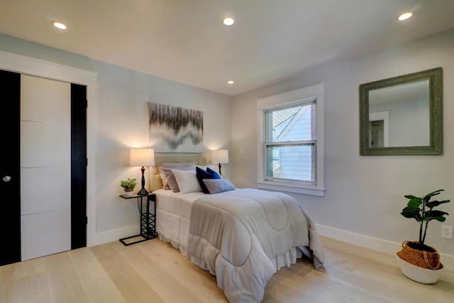 bedroom featuring light wood-type flooring