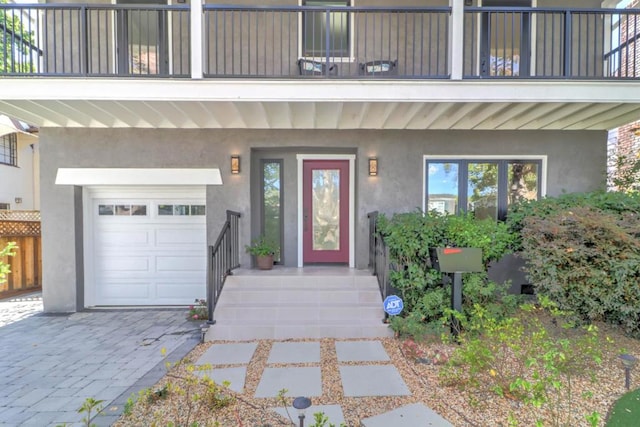 doorway to property featuring a garage