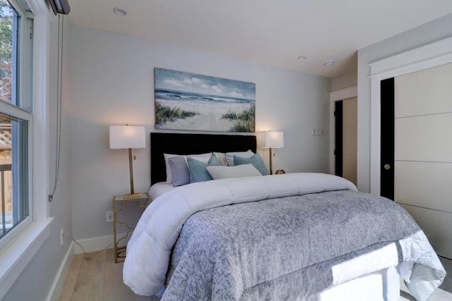 bedroom featuring light hardwood / wood-style floors