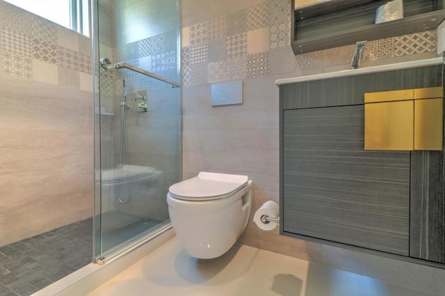 bathroom with vanity, tile walls, an enclosed shower, and toilet