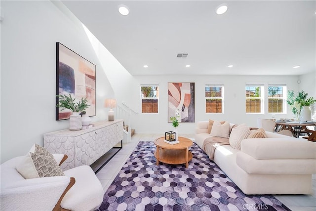 living room featuring light tile patterned flooring