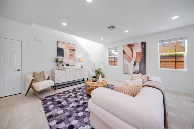 living room with light tile patterned floors