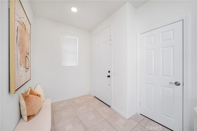 interior space featuring light tile patterned floors