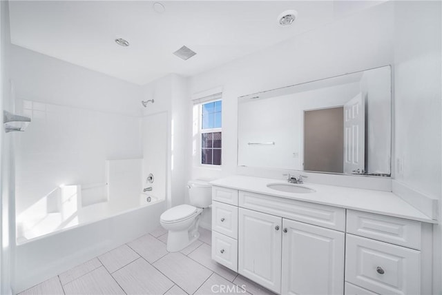 full bathroom with toilet, vanity, tile patterned floors, and shower / bathing tub combination