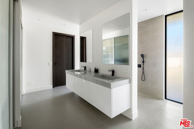 bathroom with vanity and tile patterned floors