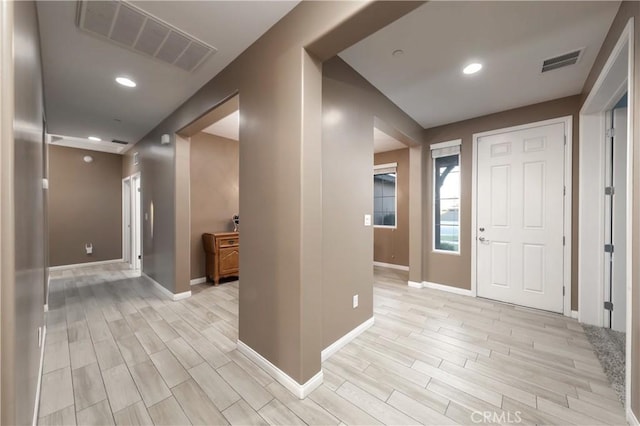 entrance foyer with light hardwood / wood-style floors