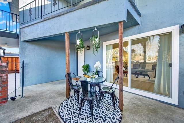 view of patio with a balcony