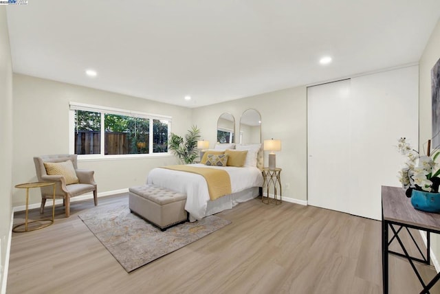 bedroom featuring light hardwood / wood-style floors