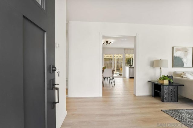 hall featuring light hardwood / wood-style flooring