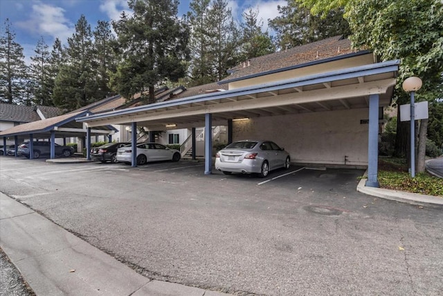 view of parking with a carport