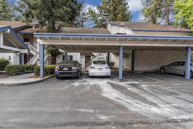 view of parking / parking lot with a carport