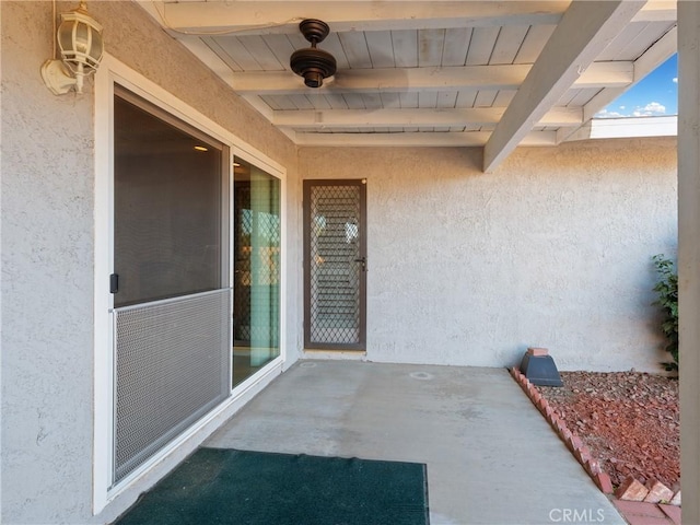 view of patio / terrace featuring ceiling fan