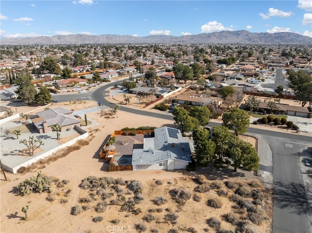 drone / aerial view featuring a mountain view