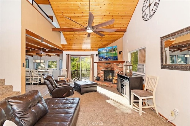 living room with high vaulted ceiling, a fireplace, carpet floors, ceiling fan, and wooden ceiling