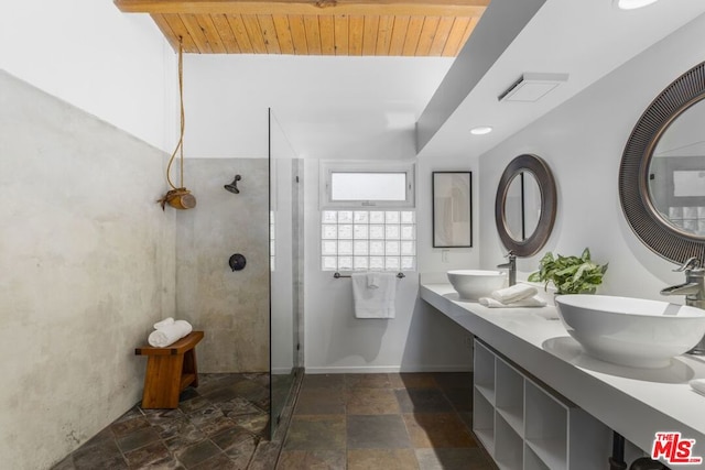 bathroom with vanity, tiled shower, and wooden ceiling