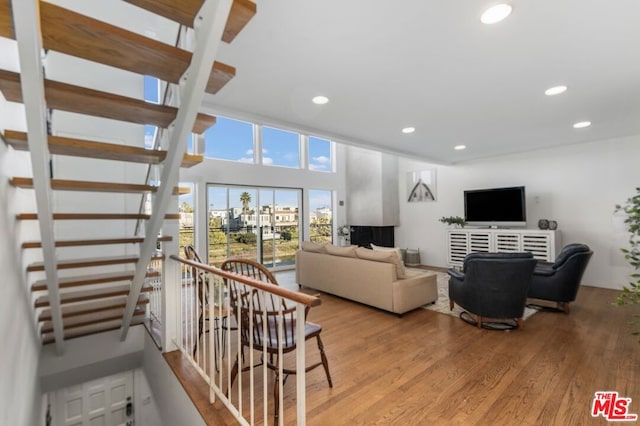 living room with light hardwood / wood-style floors