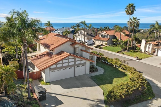 drone / aerial view featuring a water view