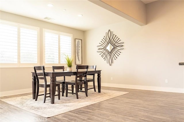 dining room featuring light hardwood / wood-style flooring