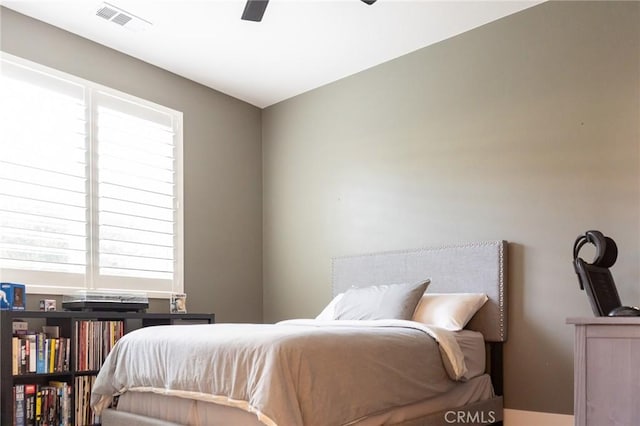 bedroom featuring ceiling fan