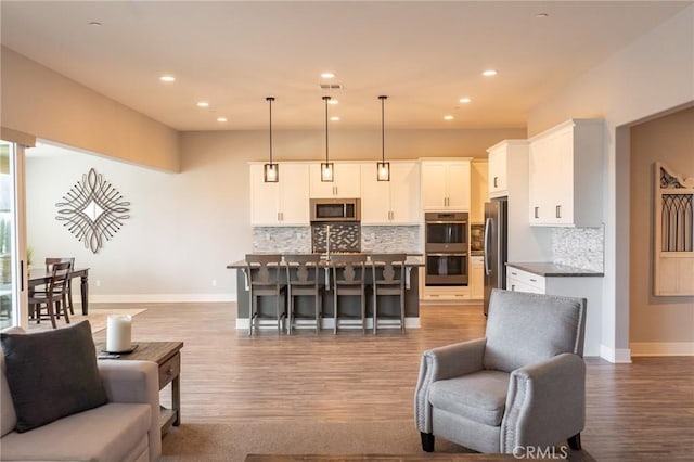 living room with light hardwood / wood-style flooring