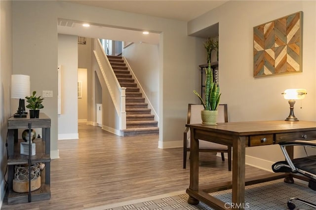 home office featuring light hardwood / wood-style flooring