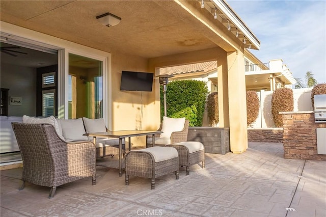 view of patio / terrace featuring an outdoor kitchen