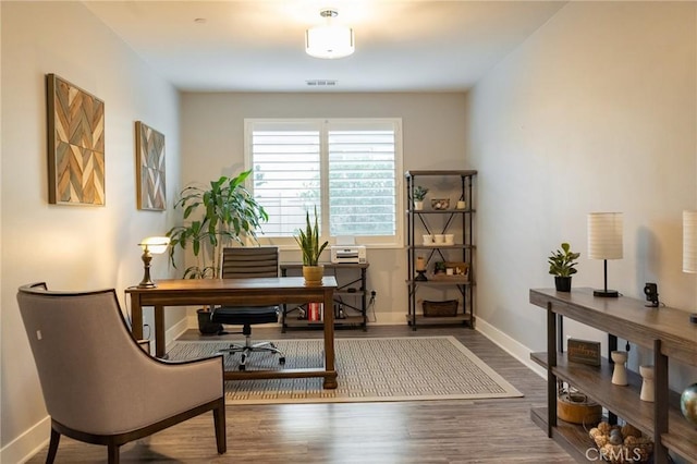 home office featuring hardwood / wood-style flooring