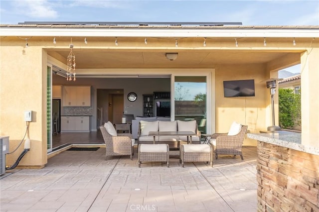 view of patio featuring an outdoor living space