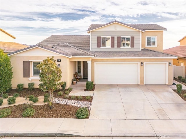 front of property featuring a garage