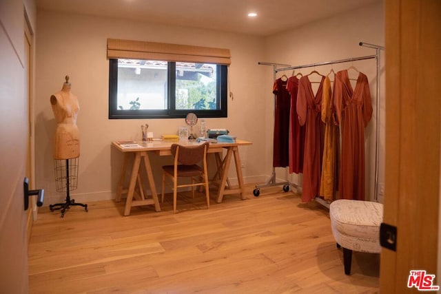 bathroom with wood-type flooring