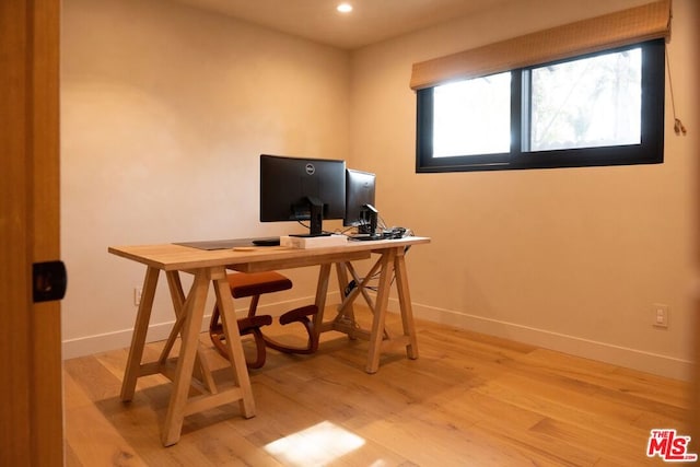 home office featuring light hardwood / wood-style floors