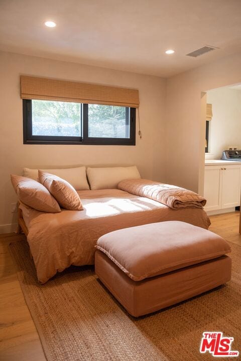 bedroom featuring light wood-type flooring