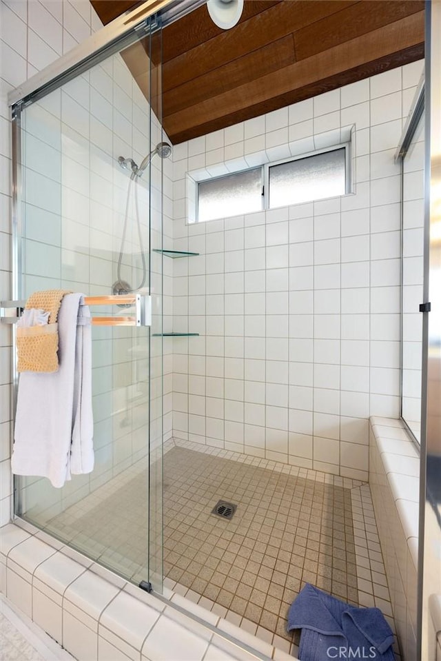 bathroom with a stall shower