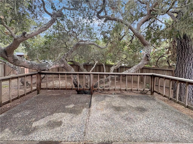 exterior space with a patio area and a fenced backyard