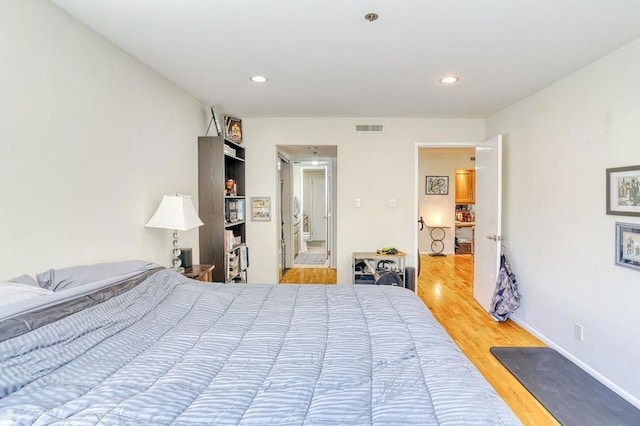 bedroom featuring hardwood / wood-style flooring