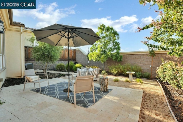 view of patio / terrace with central AC