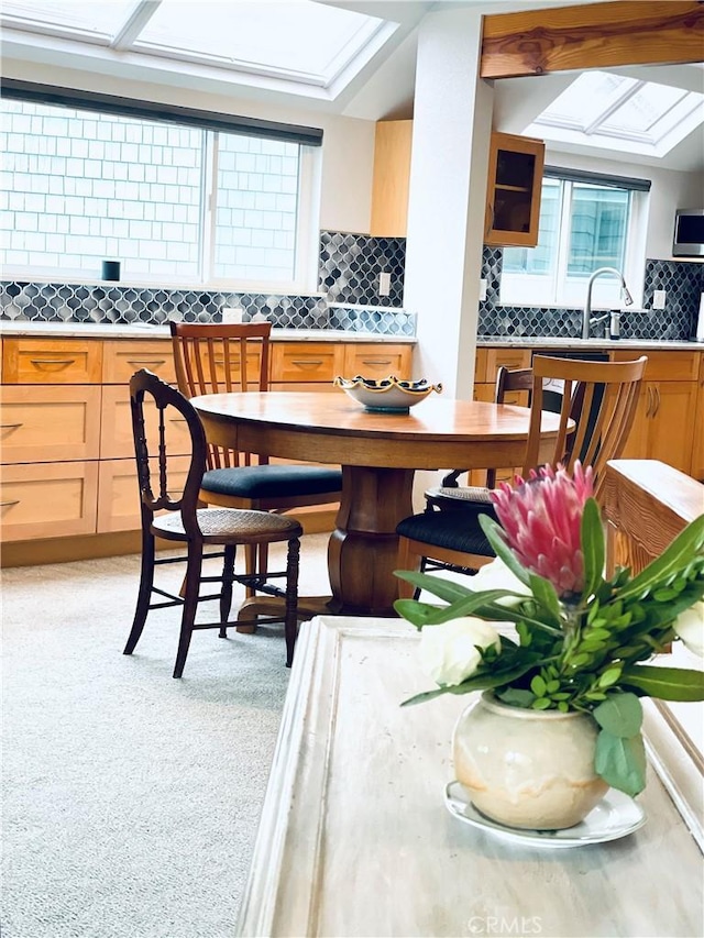 kitchen with sink and decorative backsplash