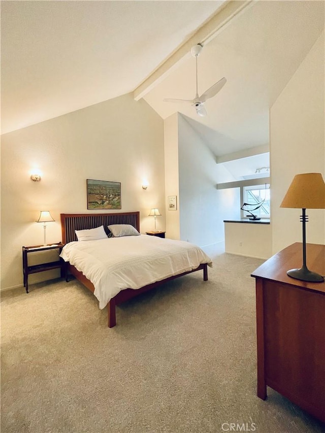 carpeted bedroom with beam ceiling, high vaulted ceiling, and ceiling fan