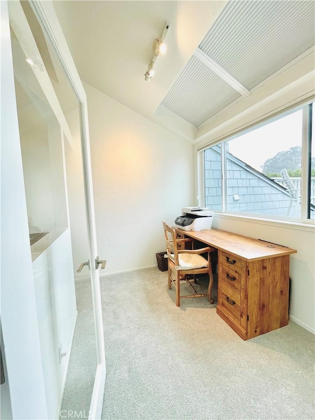 office area featuring light colored carpet and rail lighting