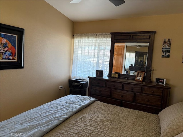 bedroom featuring ceiling fan