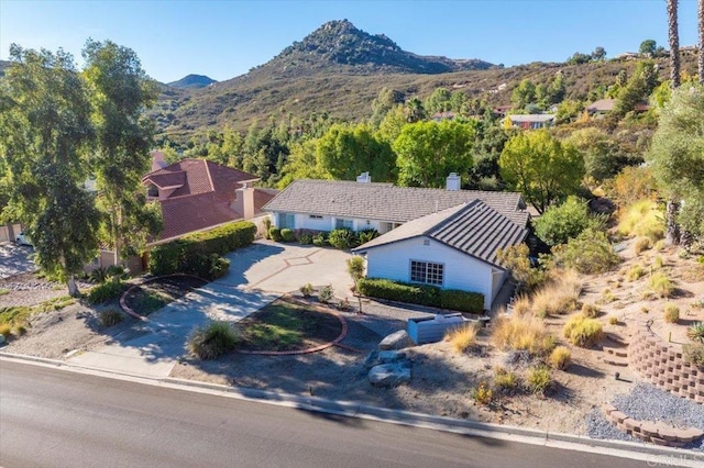 drone / aerial view featuring a mountain view